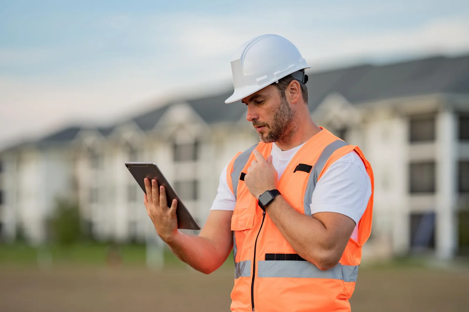 Construction leader reviewing software feature priorities